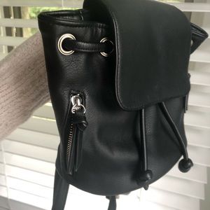 Black faux leather backpack